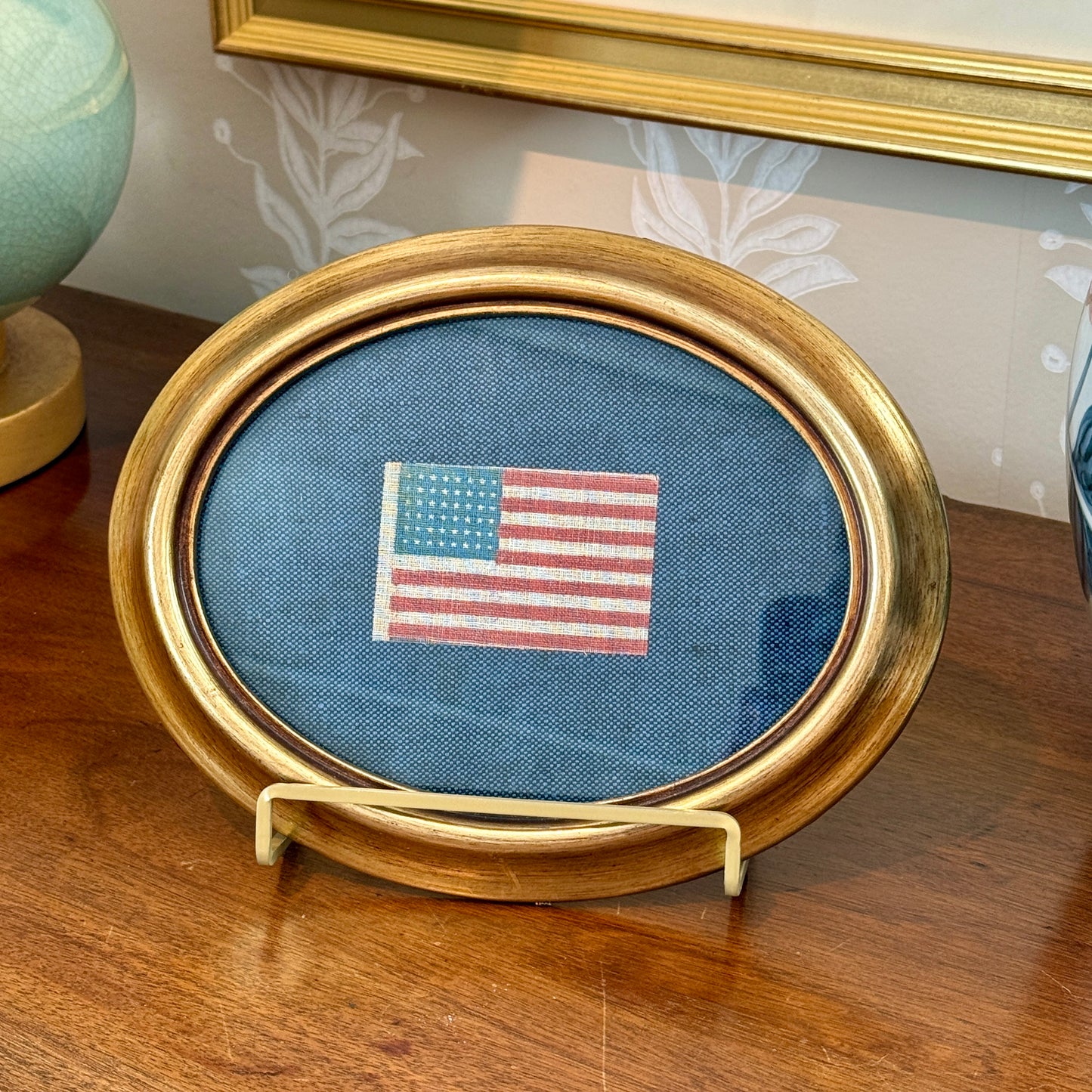 Antique 48 Star Glazed Cotton American Parade Flag on Blue Twill in Gold Oval Frame