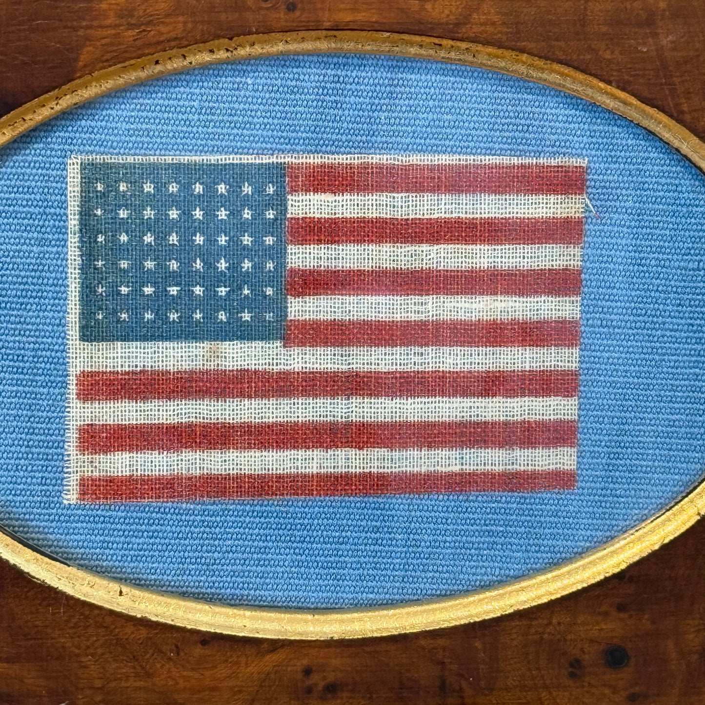 Antique 48 Star Glazed Cotton American Parade Flag on Light Blue Twill in Burlwood Frame