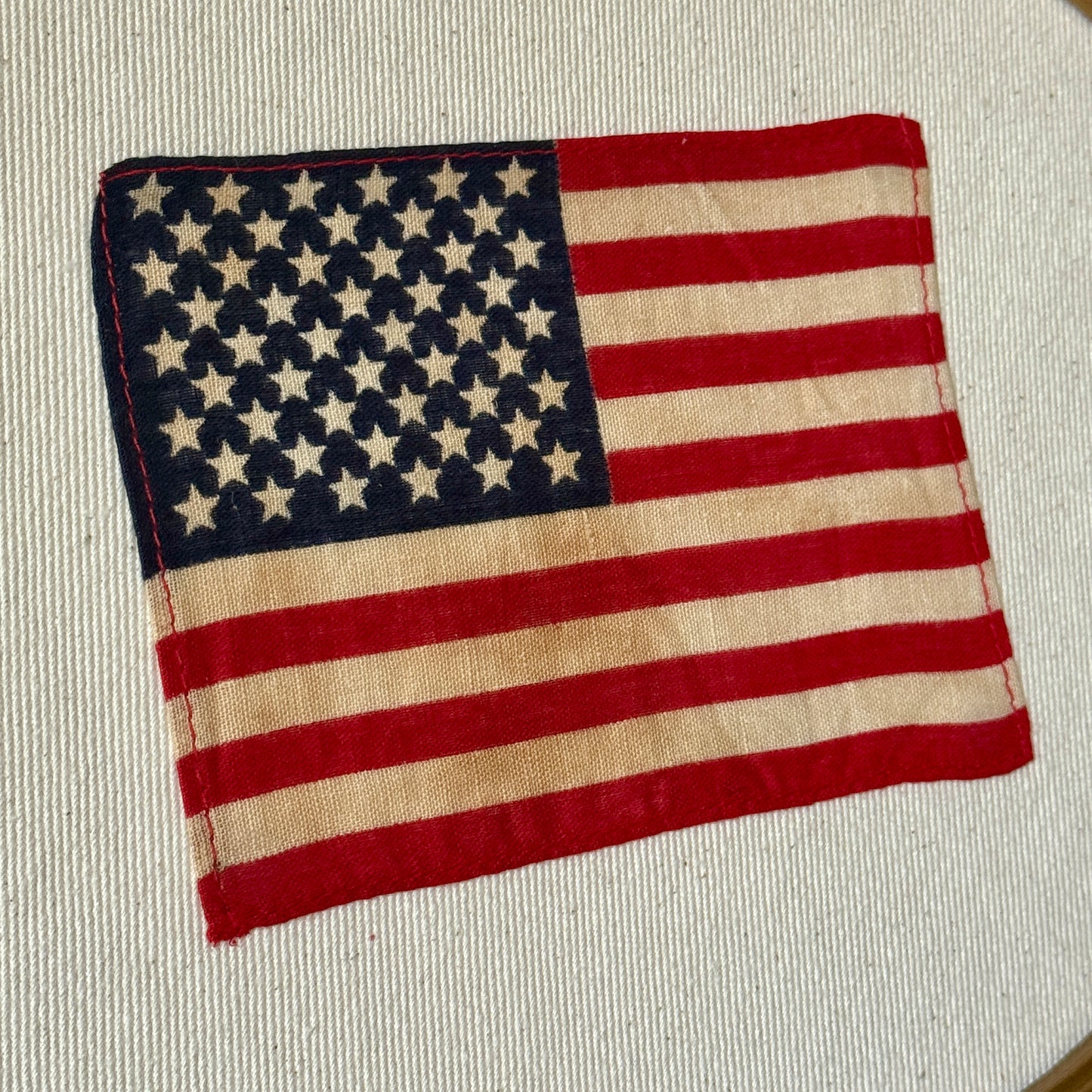 Old 50 Star American Parade Flag on Ivory Twill in Antique Oval Wood Frame