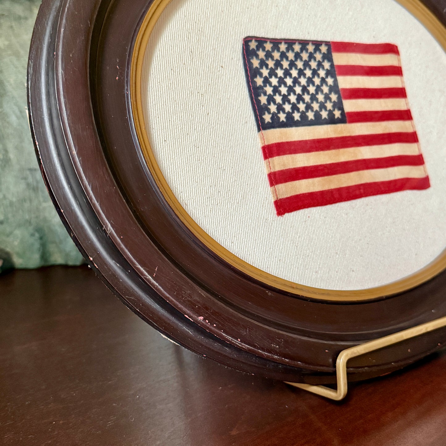 Old 50 Star American Parade Flag on Ivory Twill in Antique Oval Wood Frame