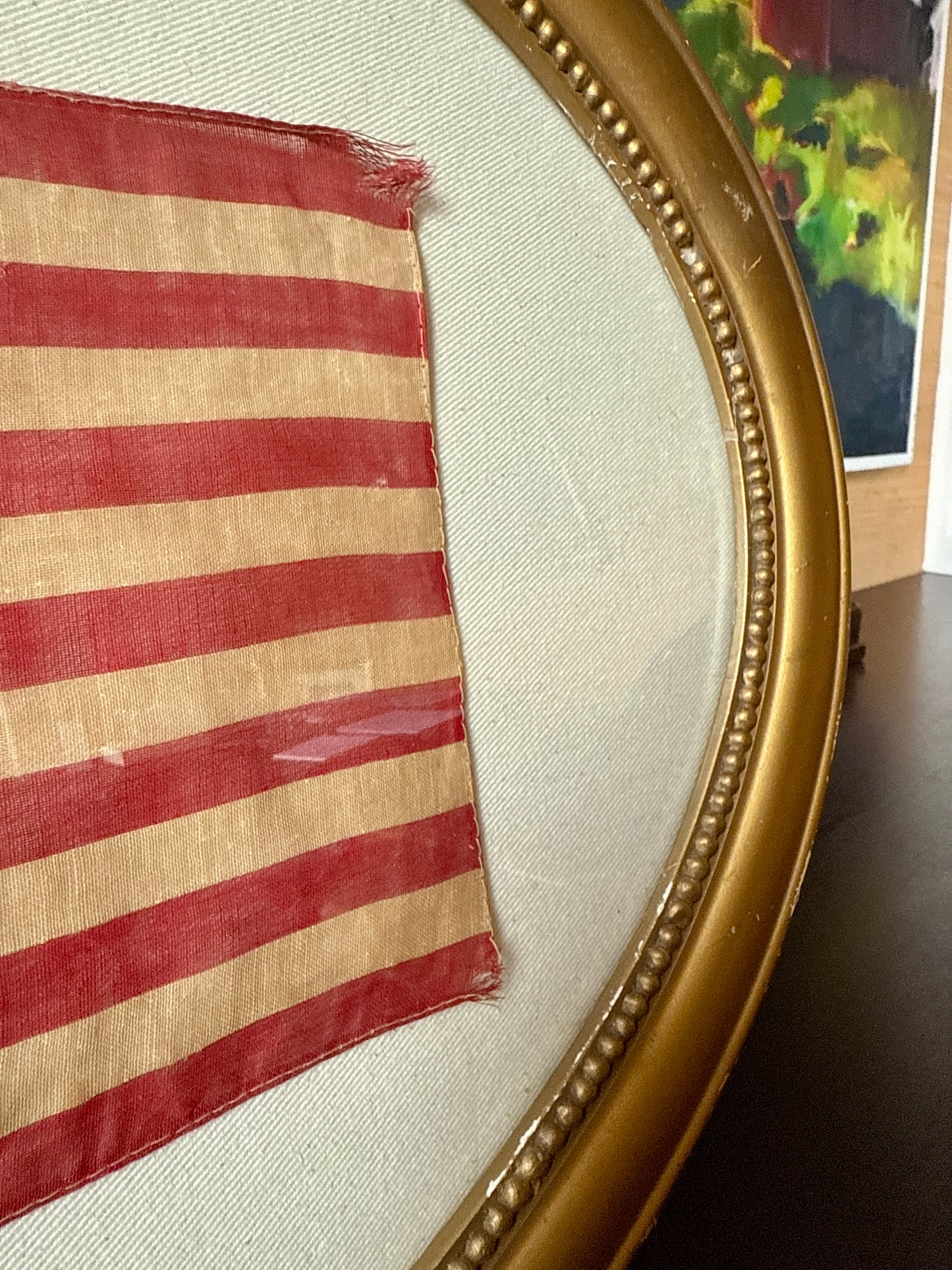 Old 50 Star American Parade Flag on Duck Cloth under Convex Glass in Antique Oval Gold Frame