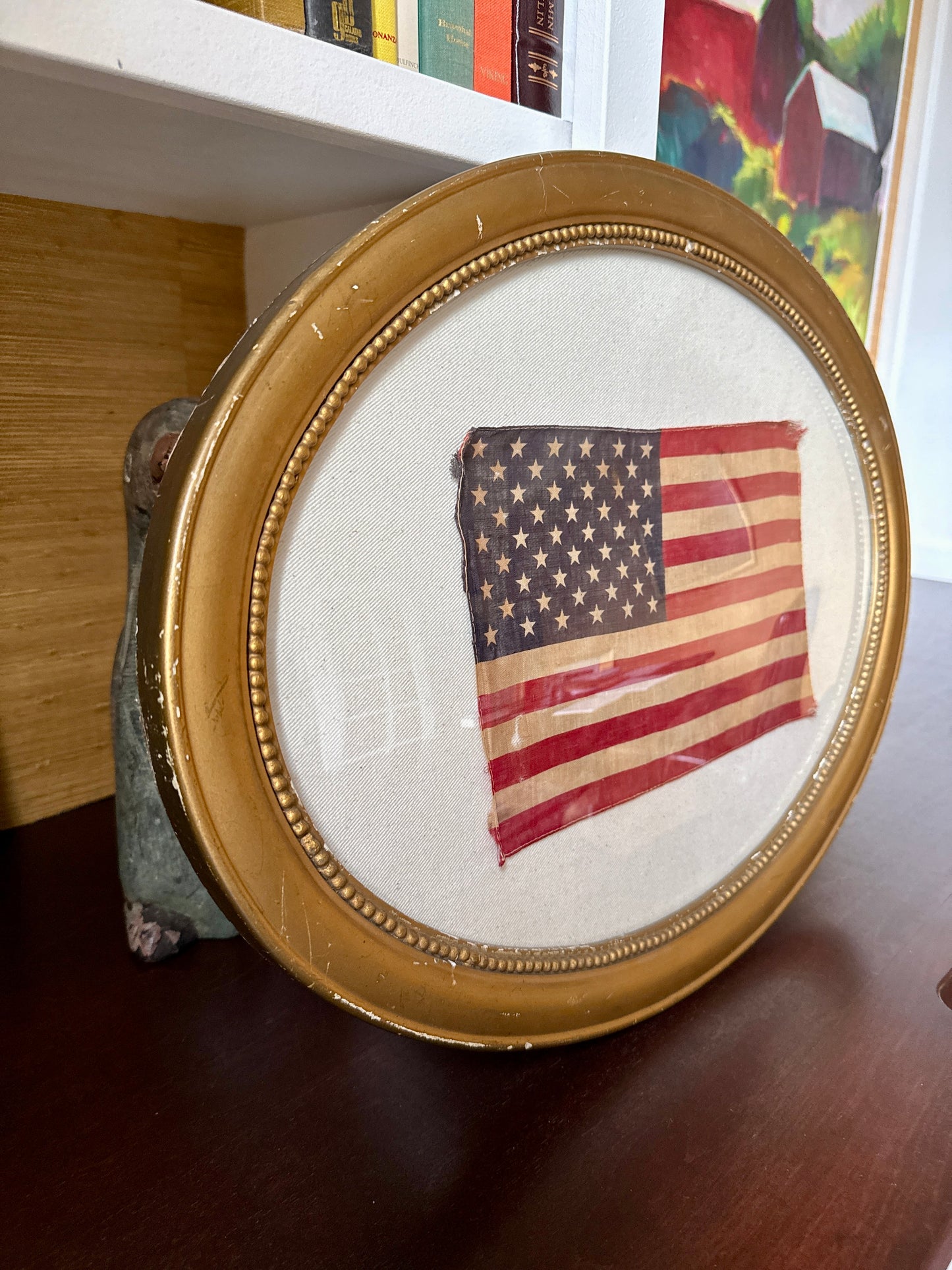 Old 50 Star American Parade Flag on Duck Cloth under Convex Glass in Antique Oval Gold Frame