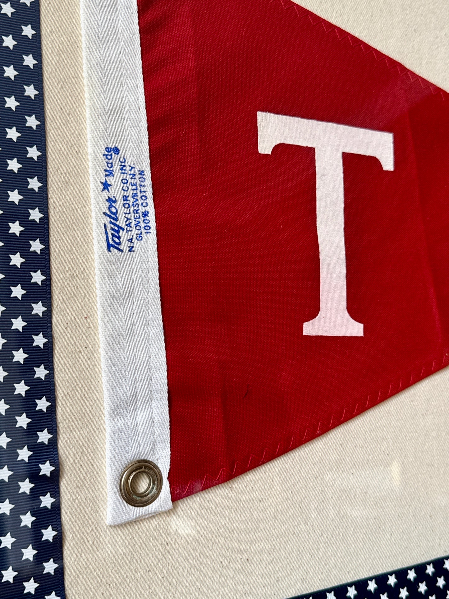 Vintage "T" Initial Canvas Burgee Nautical Flag on Ivory Twill with Navy Star Trim in Gold Frame