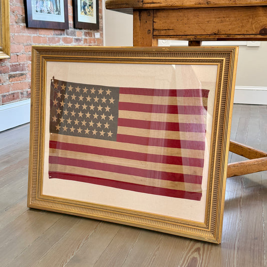 Antique 48 Staggered Star American Flag on Ivory Duck Cloth in Gold Scoop Frame