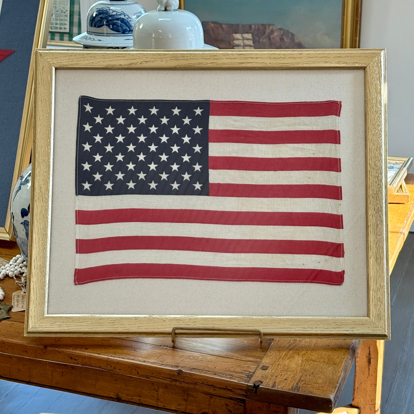 50 Star American Flag on Ivory Duck Cloth in Gold Wood Frame