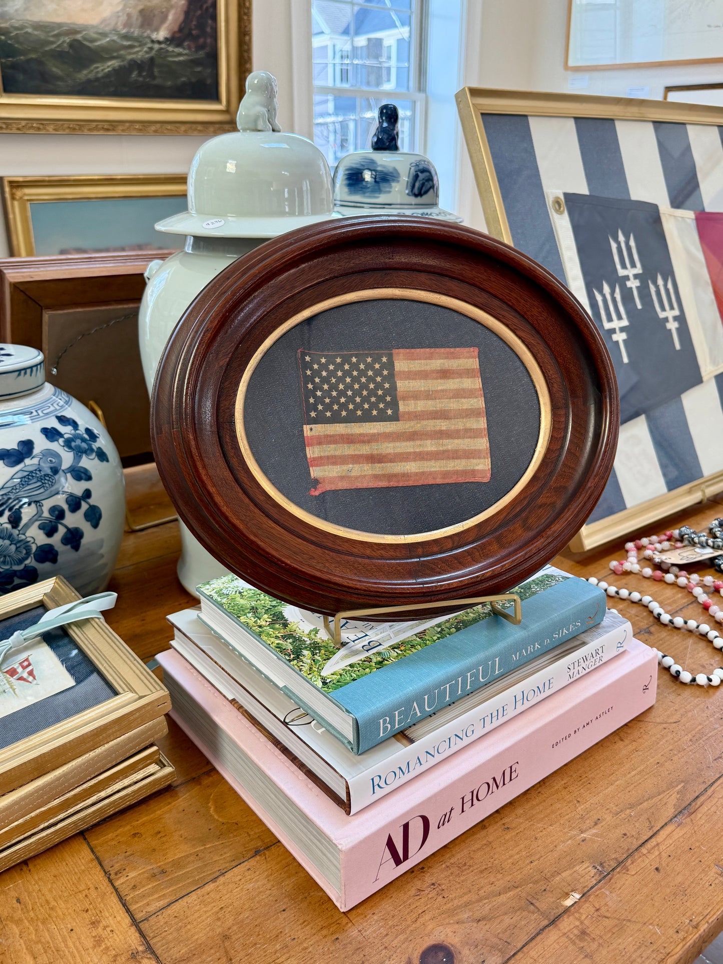 Vintage 50 Star American Parade Flag on Dark Chambray in Walnut Oval Wood Frame