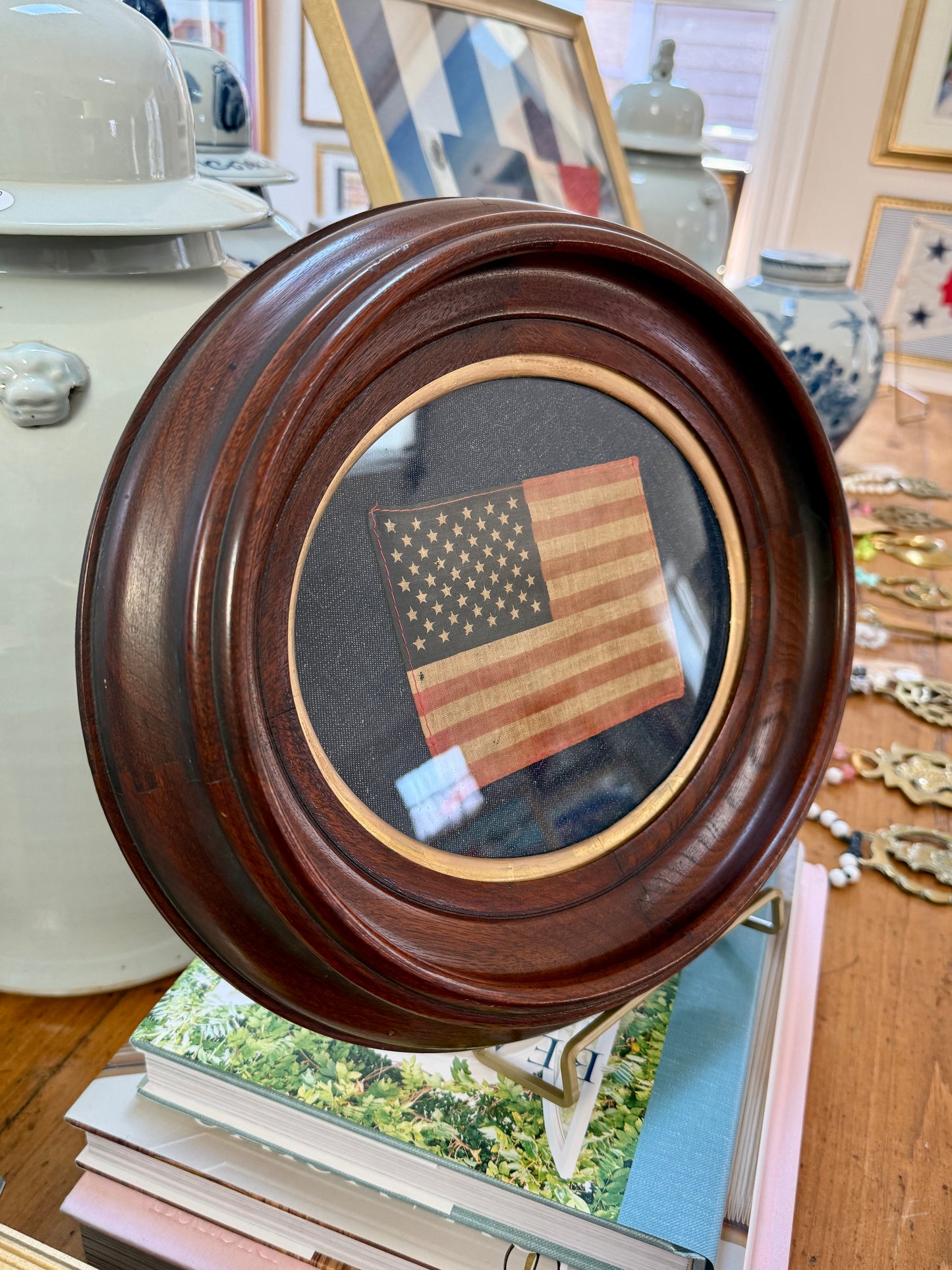 Vintage 50 Star American Parade Flag on Dark Chambray in Walnut Oval Wood Frame