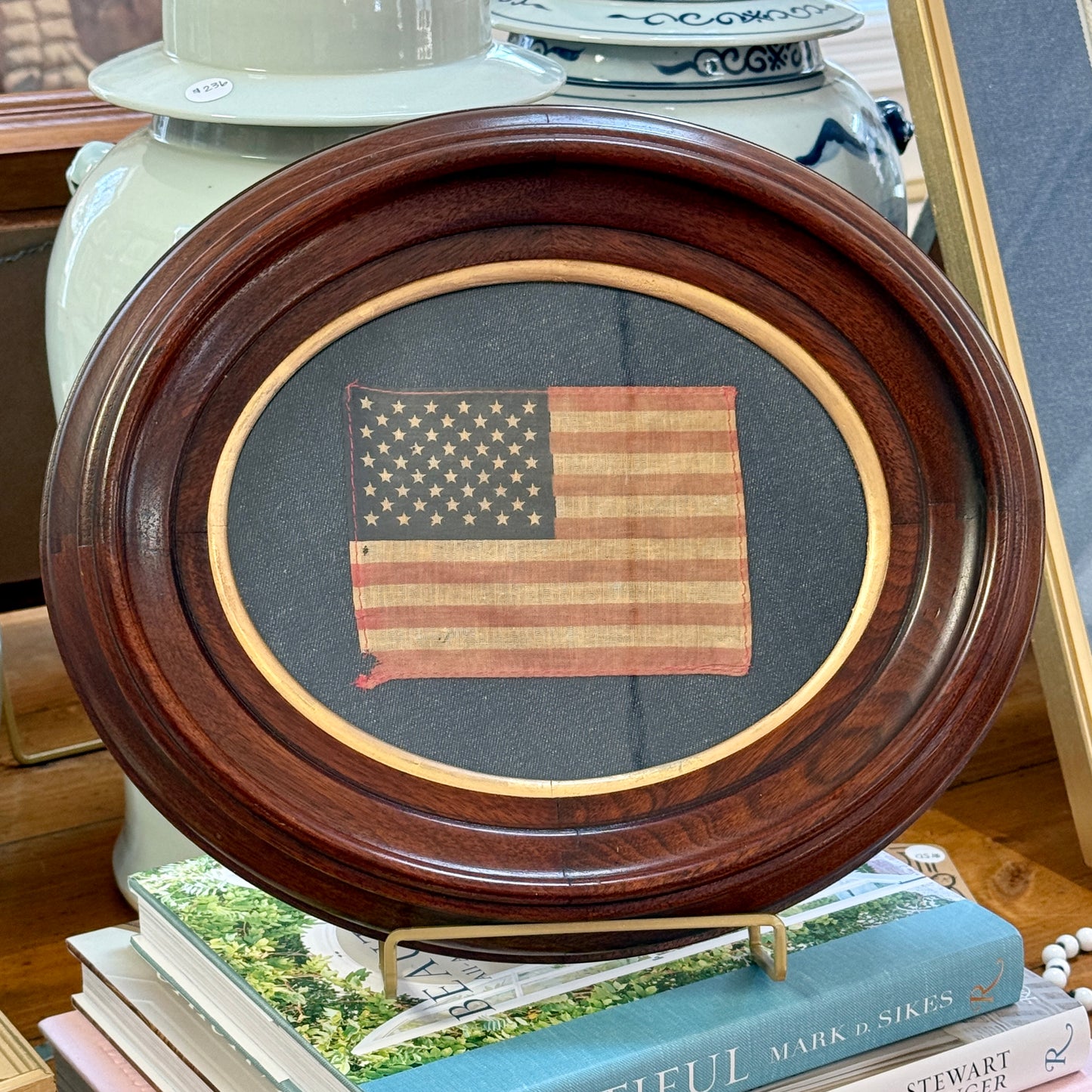 Vintage 50 Star American Parade Flag on Dark Chambray in Walnut Oval Wood Frame