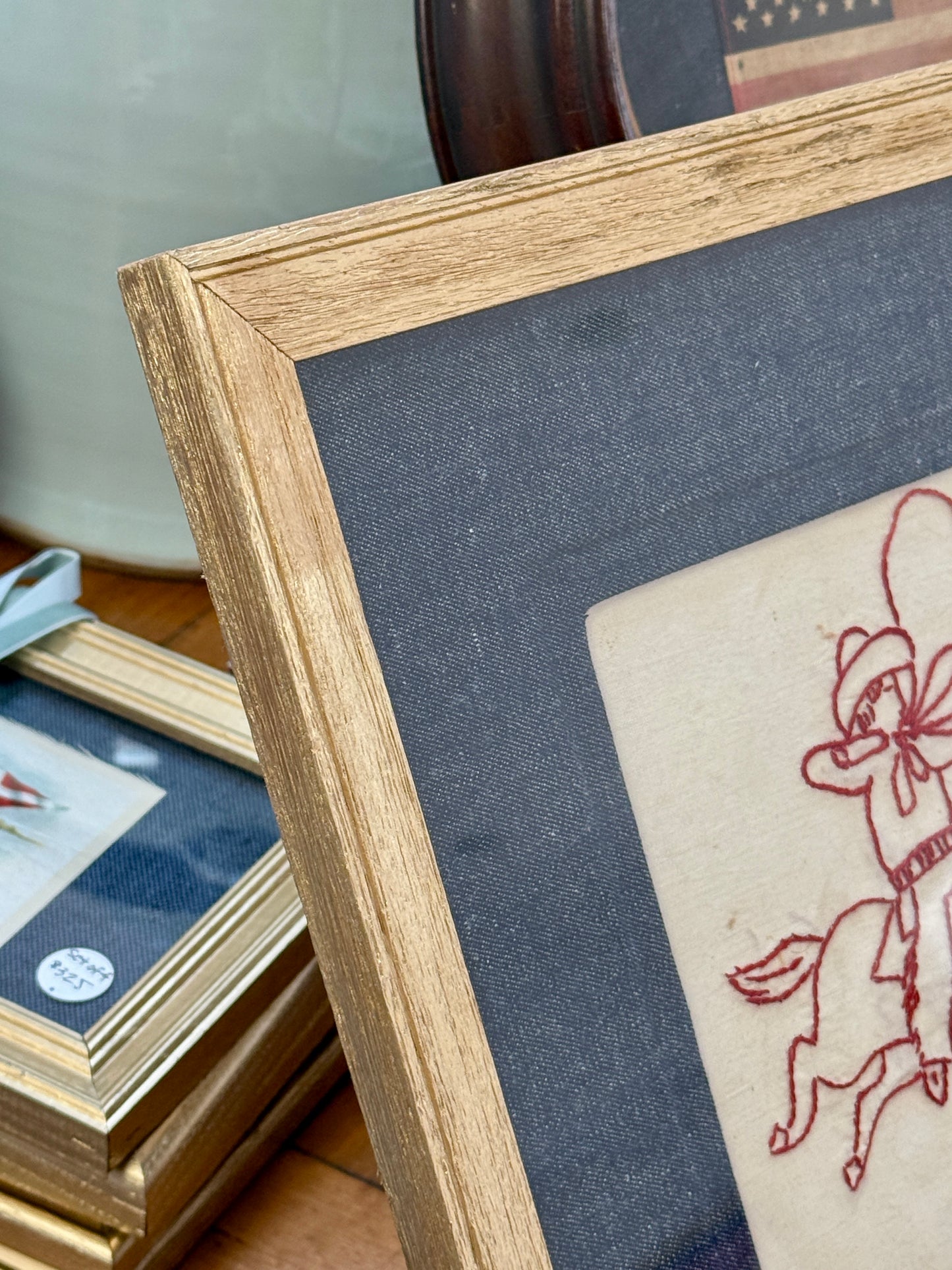 Early 20th Century Horse and Cowboy Redwork Embroidery on Dark Chambray in Wood Frame