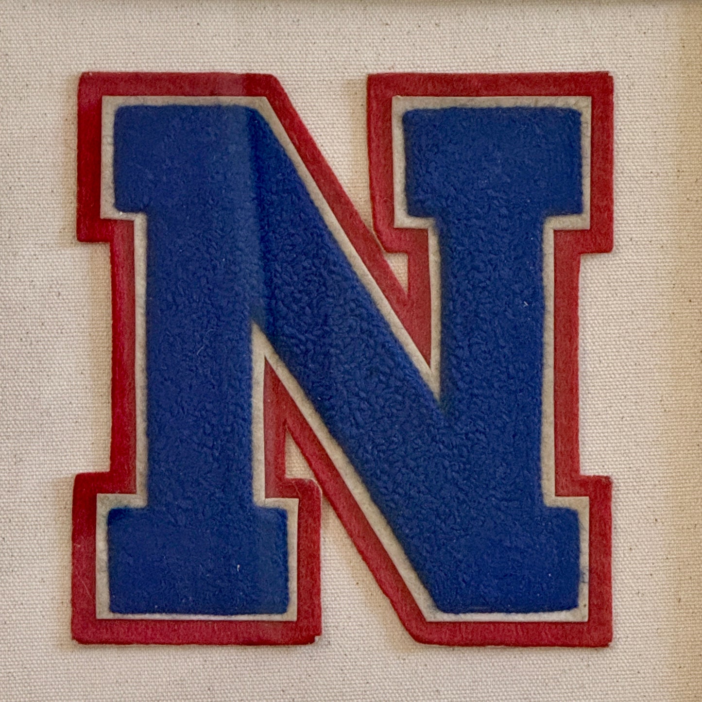 Vintage Red and Blue Varsity Letter Initial N on Ivory Duck Cloth in Gold Frame