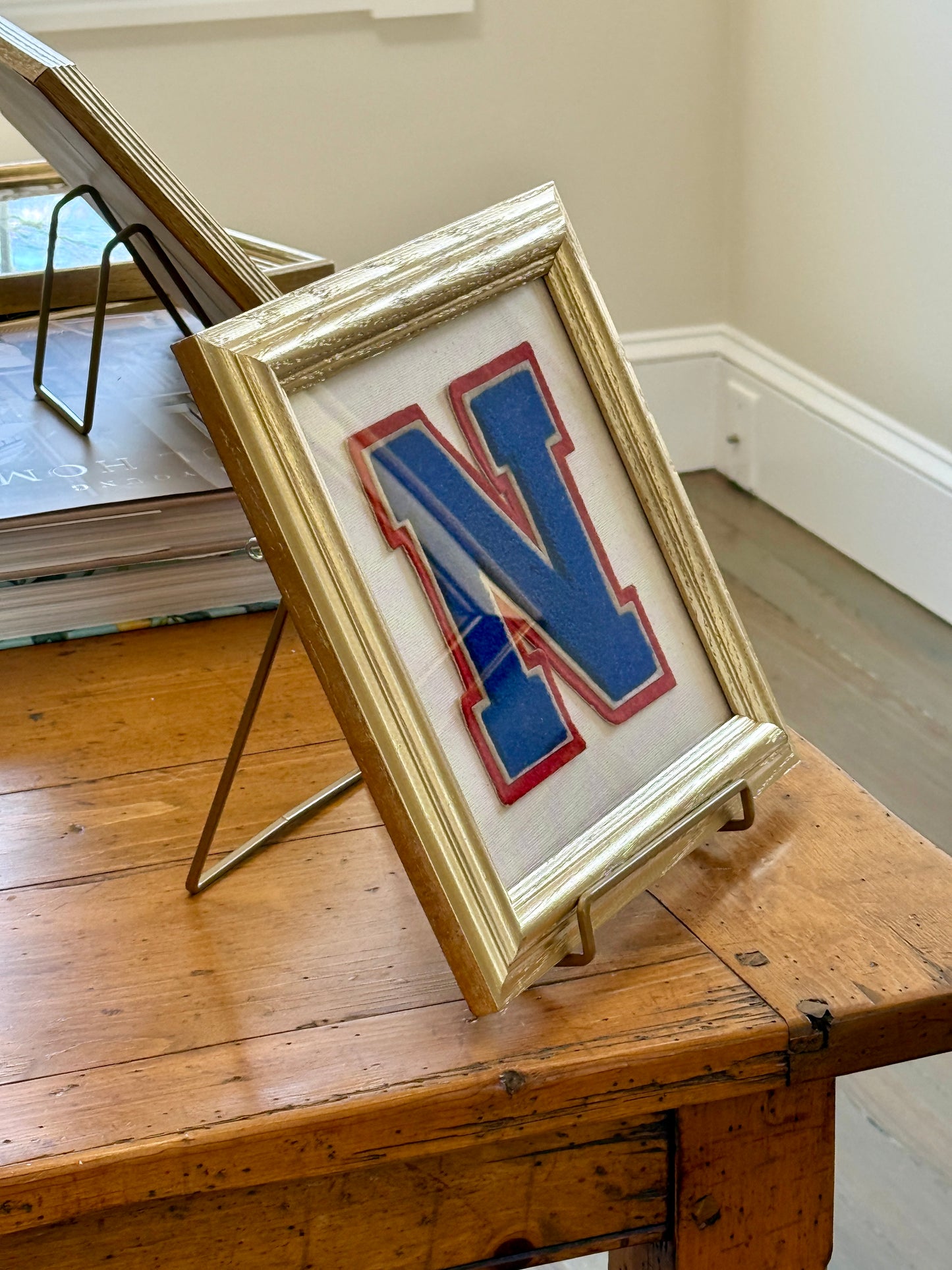 Vintage Red and Blue Varsity Letter Initial N on Ivory Duck Cloth in Gold Frame