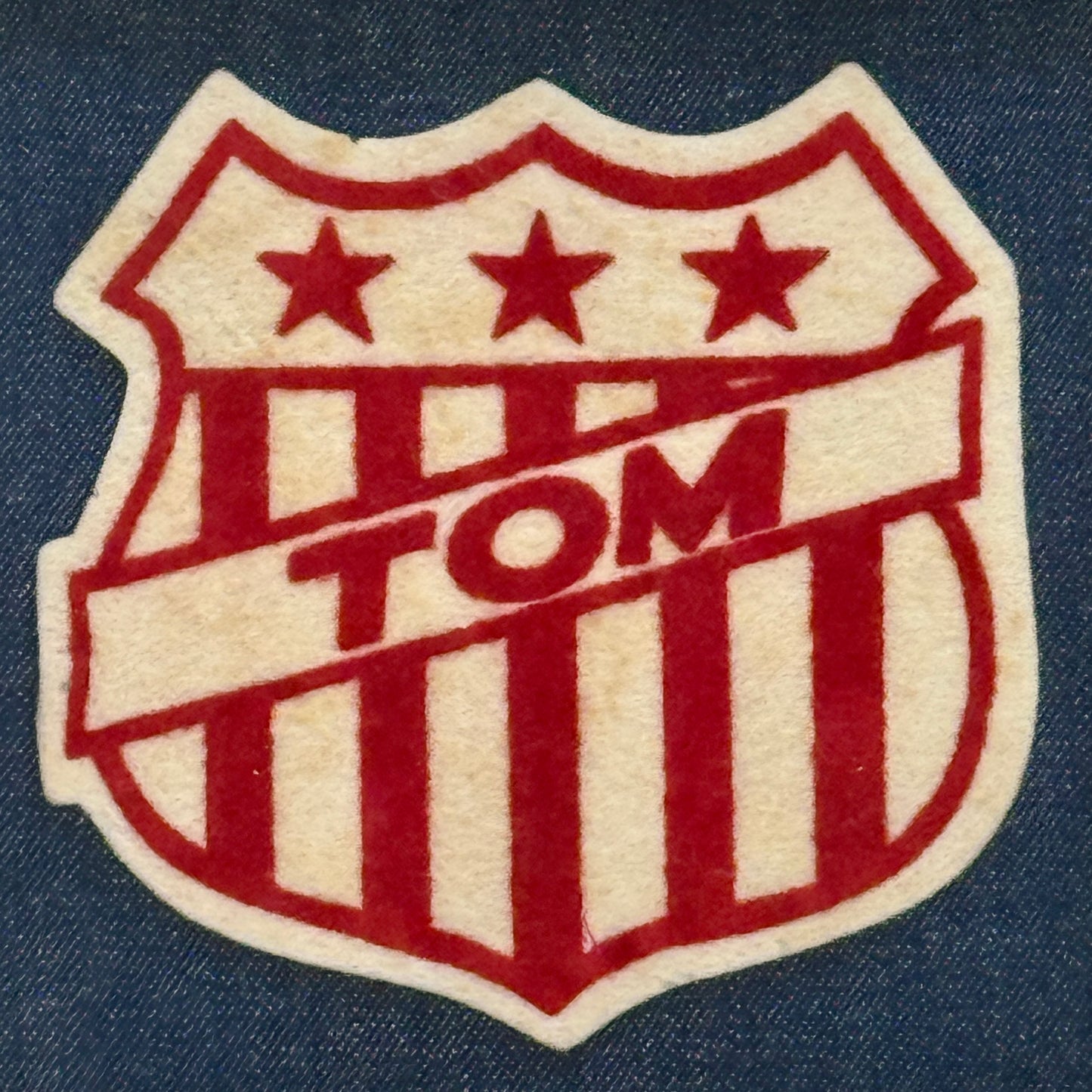 Varsity Varsity Jacket Tom Name Patch on Dark Chambray in Gold Frame