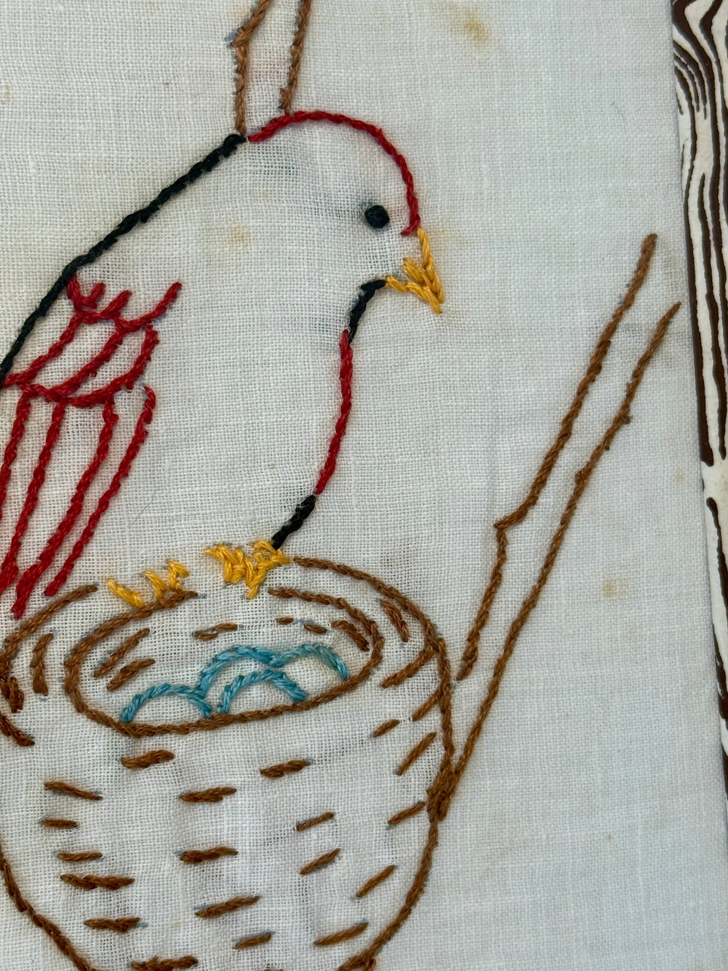 Early 20th Century Bird in Nest Redwork Embroidery on Brown Faux Bois in Gold Frame