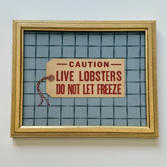 Vintage Maine Live Lobsters Tag on Light Blue Winowpane Fabric in Gold Frame