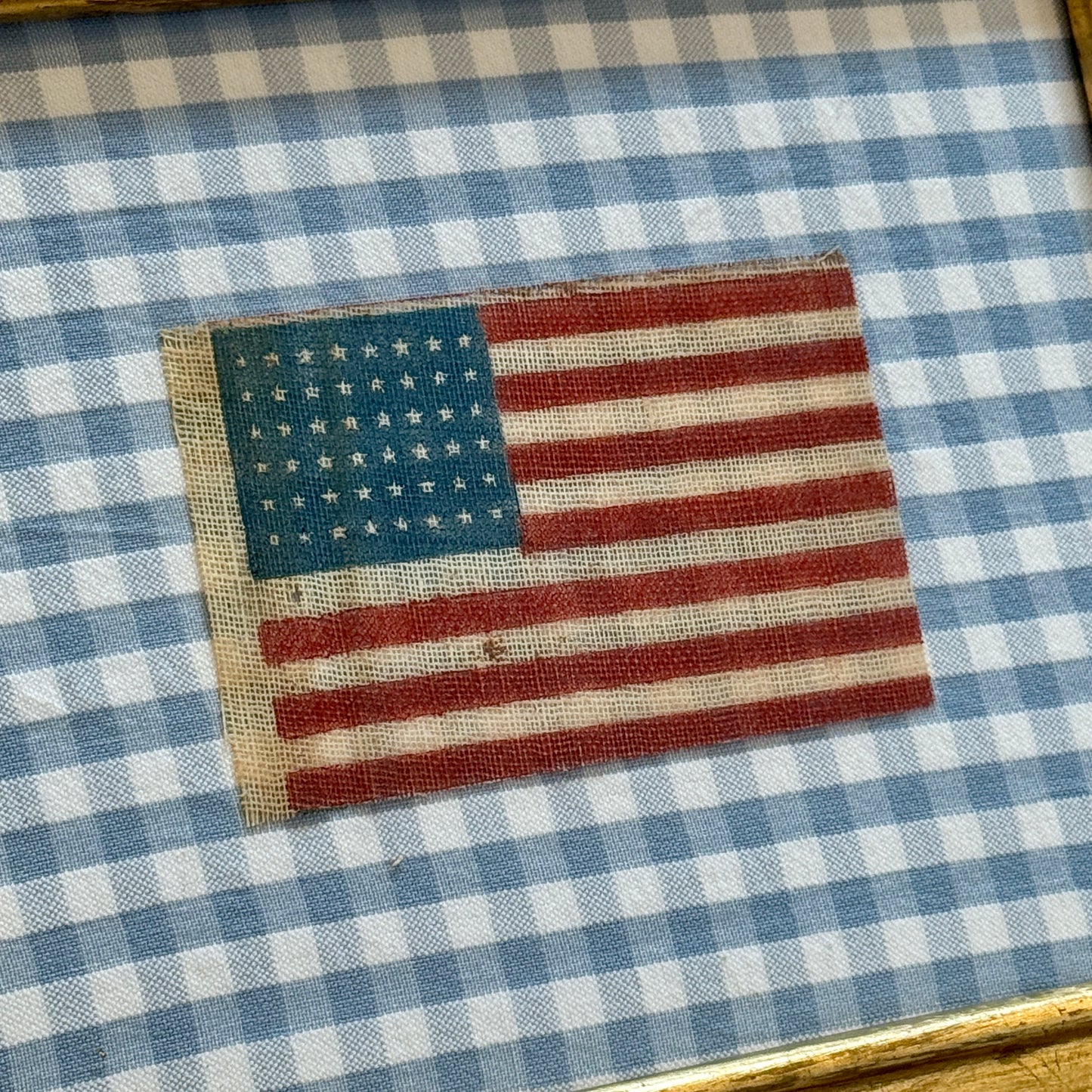 Antique 48 Star Parade Flag on Light Blue Gingham in Old Wood and Gilded Frame