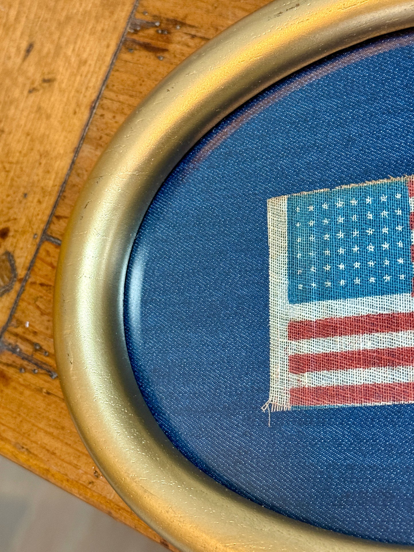 Antique 48 Star Parade Flag on Navy Canvas in Gilded Oval Frame