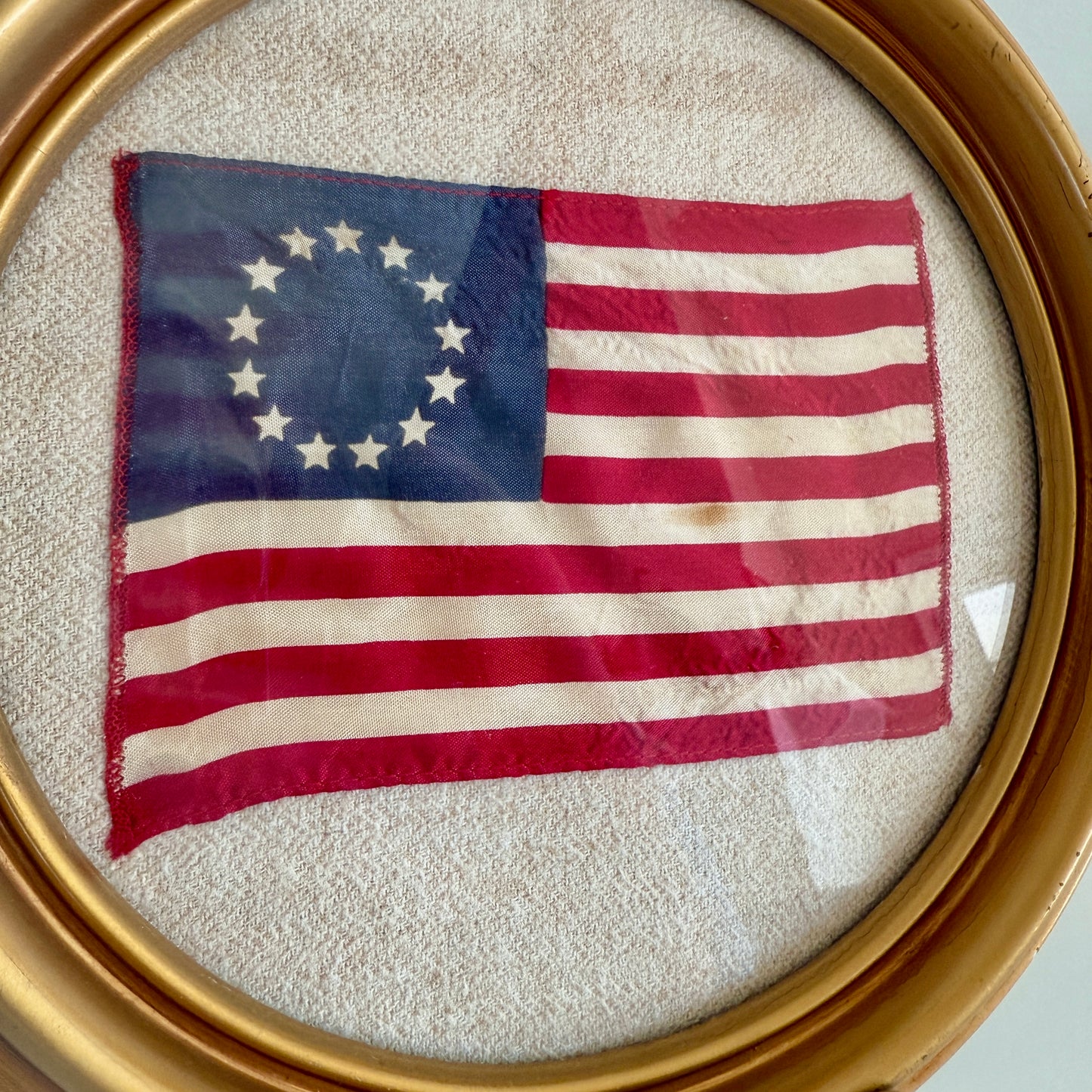 Vintage 13 Star American Betsy Ross Parade Flag on Ivory Herringbone in Gold Round Frame