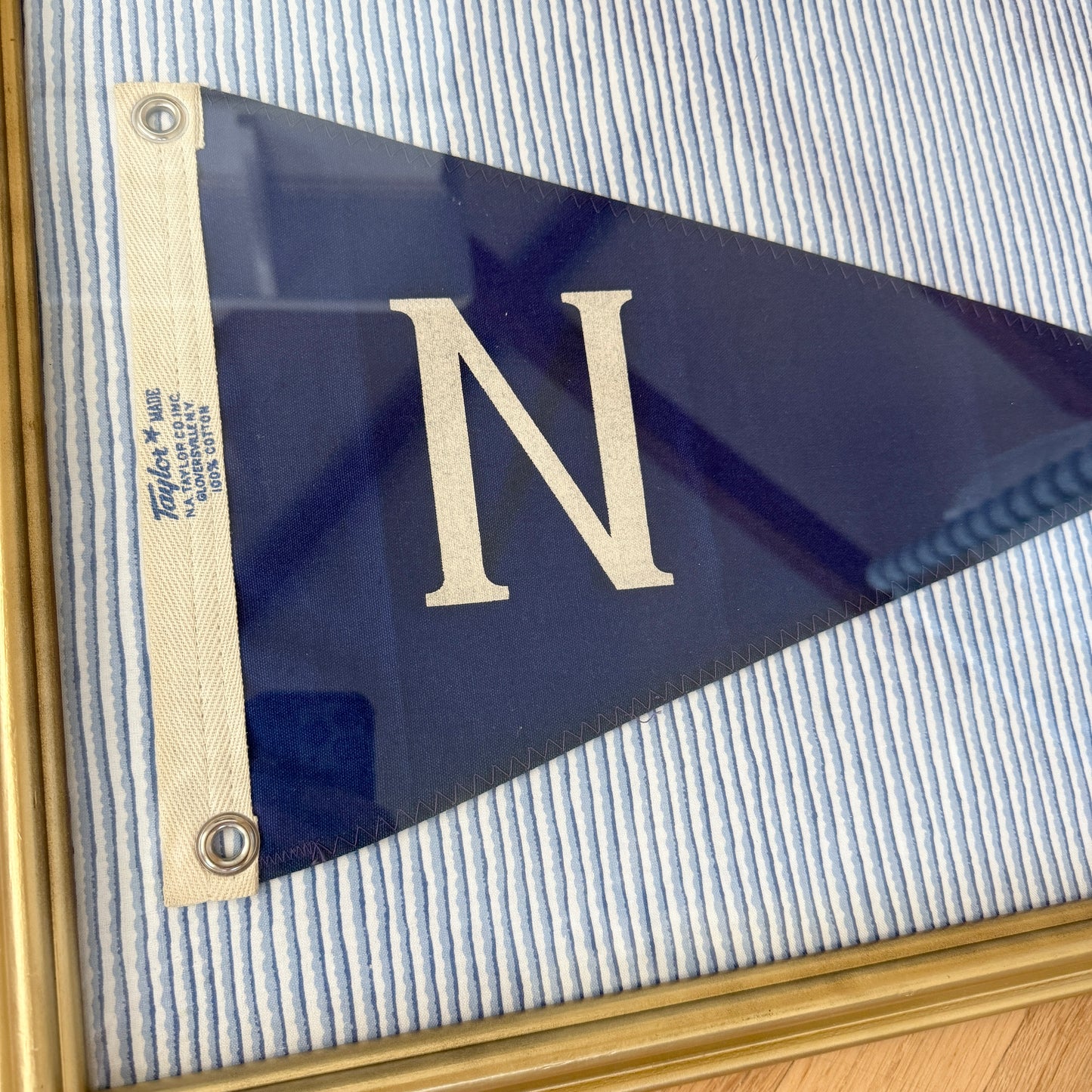 Vintage "N" Burgee Nautical Flag on Blue Wavy Striped Fabric in Gold Frame