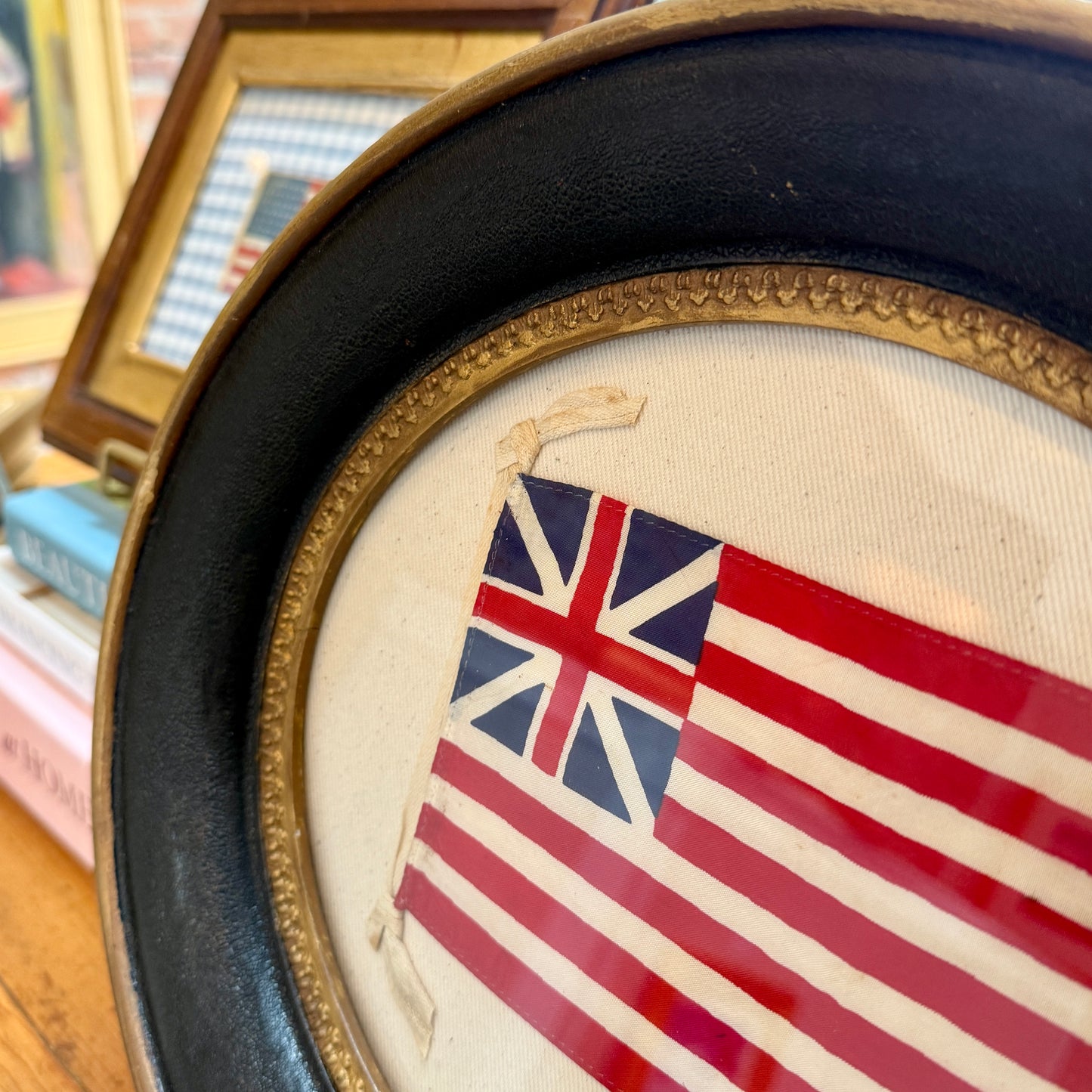 Grand Union American Revolutionary War Flag in Antique Oval Black and Gilded Frame