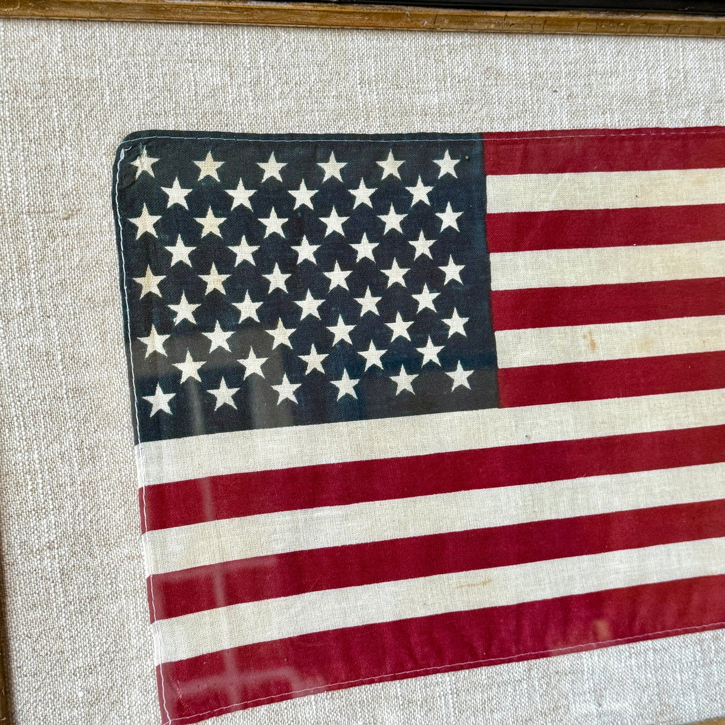 50 Star American Flag on Natural Linen in Antique Black and Gilded Frame