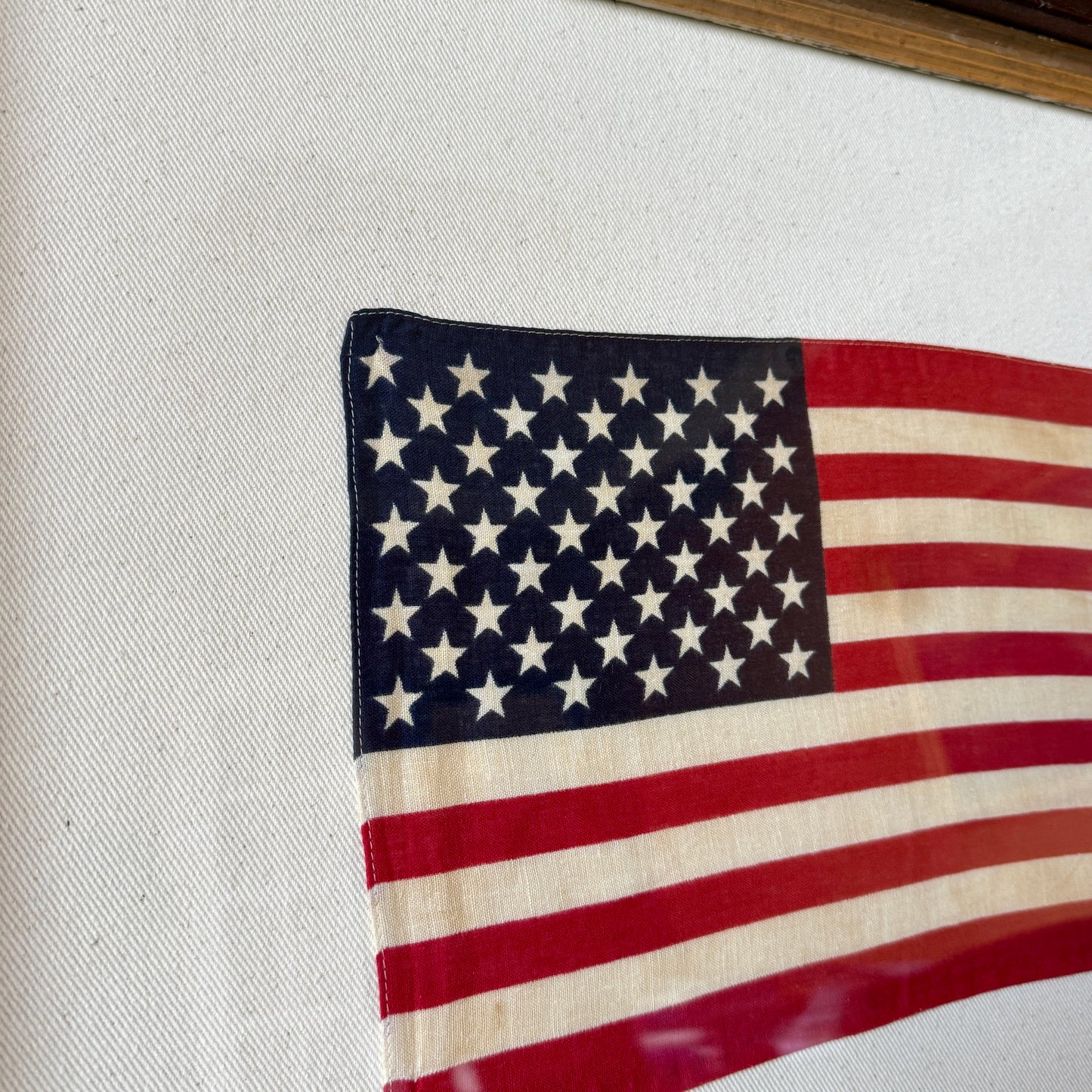 50 Staggered Star American Flag on Ivory Twill in Antique Wood and Gilded Frame