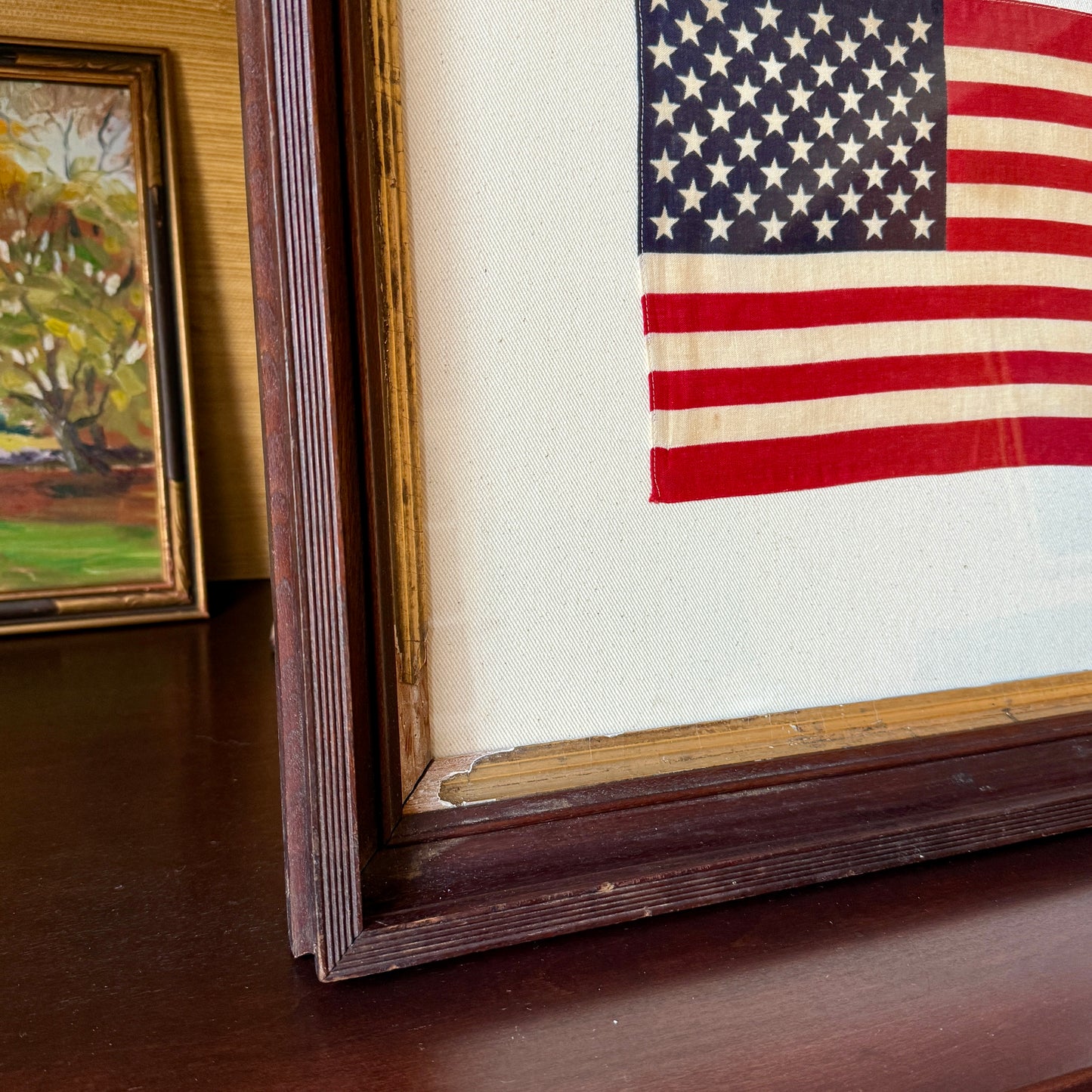 50 Staggered Star American Flag on Ivory Twill in Antique Wood and Gilded Frame