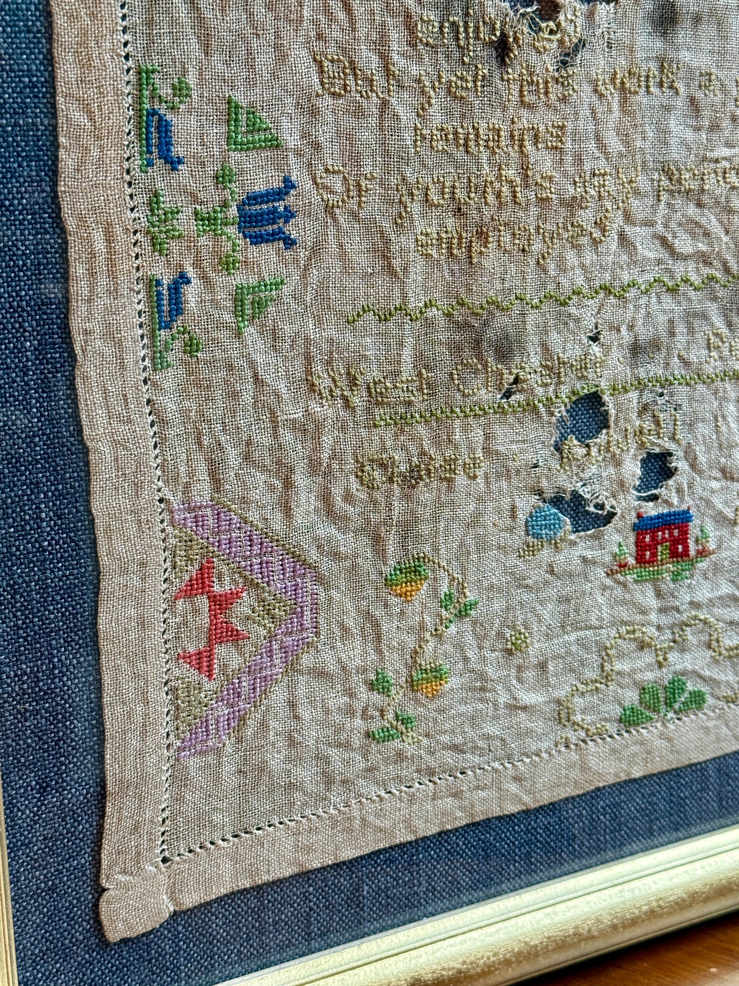 1934 West Chester, PA Needlepoint Sampler by Eloise Powell Waggoner on Blue Twill in Gold Frame