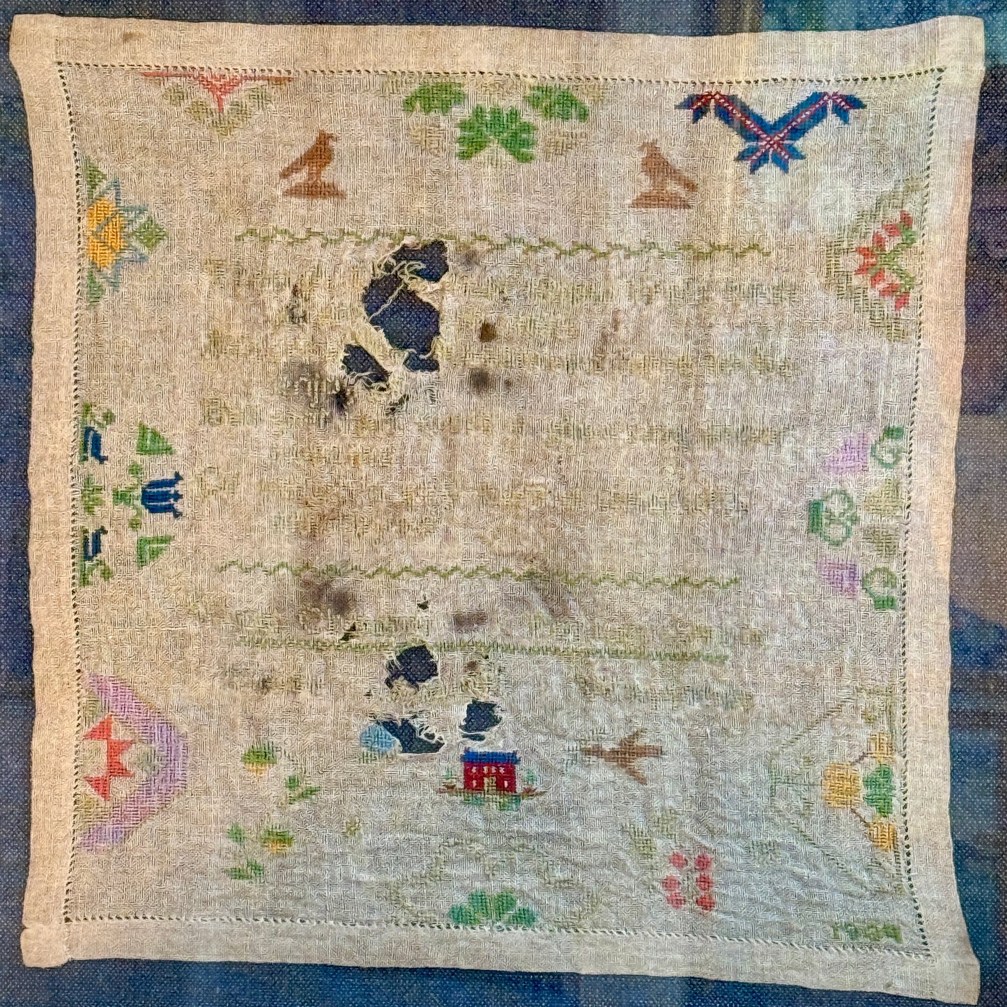 1934 West Chester, PA Needlepoint Sampler by Eloise Powell Waggoner on Blue Twill in Gold Frame